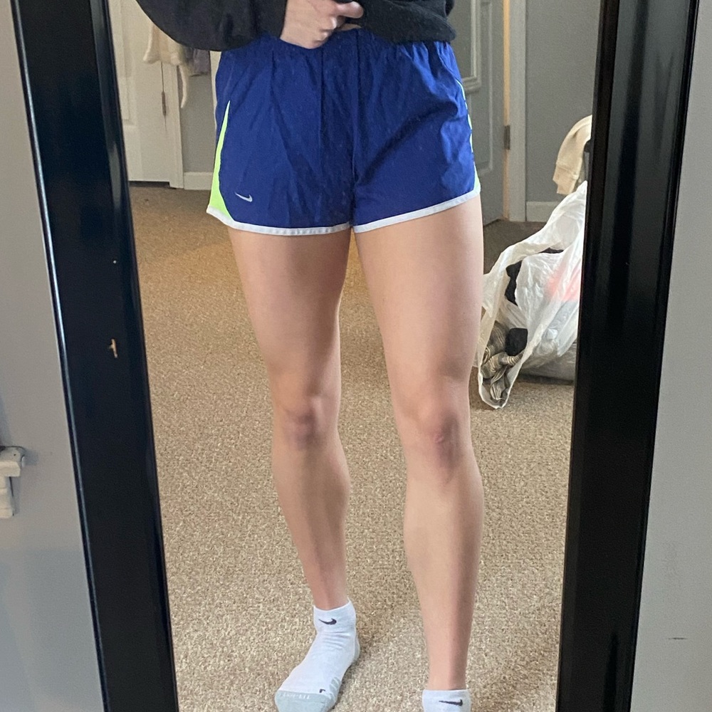 Blue Nike running shorts